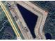 Aerial view showcasing a waterfront community with roads and lots at 4350 Sagefield Dr, St Cloud, FL 34773