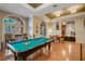 Relaxing game room with a billiard table and comfortable seating at 513 Mirasol Cir # 207, Celebration, FL 34747