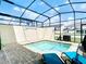 Private screened pool with patio and lounge chairs. Perfect for relaxation! at 8976 Amelia Downs Trl, Kissimmee, FL 34747