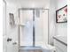 Clean bathroom with a shower/tub combo and modern vanity at 8976 Amelia Downs Trl, Kissimmee, FL 34747
