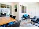 Covered patio with outdoor seating and adjacent to private pool at 8976 Amelia Downs Trl, Kissimmee, FL 34747