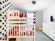 bedroom with bunk beds and polka dot wall at 8976 Amelia Downs Trl, Kissimmee, FL 34747