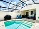 Private screened pool with patio, lounge chairs, and grill. Relax and enjoy! at 8976 Amelia Downs Trl, Kissimmee, FL 34747