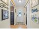 Bright and spacious entryway with decorative wall art at 2727 N Juliet Dr, Deltona, FL 32738