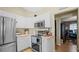 Well-equipped kitchen with stainless steel appliances and white cabinets at 2727 N Juliet Dr, Deltona, FL 32738