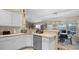 Spacious kitchen with lots of cabinet space and a breakfast bar at 2727 N Juliet Dr, Deltona, FL 32738