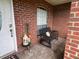 Front porch with a bench and fall decor at 2727 N Juliet Dr, Deltona, FL 32738