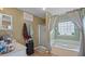 Main bathroom with a shower and garden tub at 2727 N Juliet Dr, Deltona, FL 32738