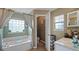 Bathroom with a large garden tub and walk in shower at 2727 N Juliet Dr, Deltona, FL 32738