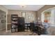 Home office with built-in shelving and ample workspace at 2727 N Juliet Dr, Deltona, FL 32738