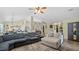 Open living room with comfortable seating and views to kitchen at 2727 N Juliet Dr, Deltona, FL 32738