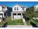 Two story house with porch and landscaping at 1429 Happy Bird Ln, Winter Springs, FL 32708