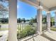 Covered porch overlooking a pond at 1429 Happy Bird Ln, Winter Springs, FL 32708