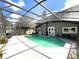 Inviting screened pool area with ample space for relaxation and entertainment at 14534 Potanow Trl, Orlando, FL 32837