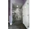 Large walk-in shower with modern tile at 14534 Potanow Trl, Orlando, FL 32837