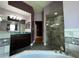 Bathroom with double sinks, shower, and tub at 14534 Potanow Trl, Orlando, FL 32837