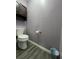 Small bathroom with toilet and storage at 14534 Potanow Trl, Orlando, FL 32837