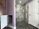 Updated bathroom with a large walk-in shower and modern fixtures at 14534 Potanow Trl, Orlando, FL 32837