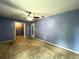 Bedroom with walk-in closet and ceiling fan at 14534 Potanow Trl, Orlando, FL 32837
