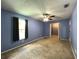 Bedroom with walk-in closet and neutral decor at 14534 Potanow Trl, Orlando, FL 32837