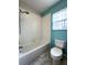 Clean bathroom with shower/tub combo and tile at 14534 Potanow Trl, Orlando, FL 32837