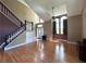 Spacious living room with hardwood floors and vaulted ceilings at 14534 Potanow Trl, Orlando, FL 32837