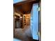 Unfinished basement with wooden shelves and access to storage at 14534 Potanow Trl, Orlando, FL 32837
