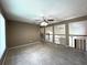 Spacious living room with high ceilings and carpeting at 14534 Potanow Trl, Orlando, FL 32837