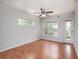 Bright living room with wood flooring and access to balcony at 4316 S Kirkman Rd # 1602, Orlando, FL 32811