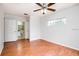 Second bedroom with wood flooring and access to bathroom at 4316 S Kirkman Rd # 1602, Orlando, FL 32811