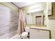 Clean bathroom with updated vanity and tiled shower/tub at 4316 S Kirkman Rd # 1602, Orlando, FL 32811