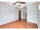 Bright bedroom with wood flooring and ceiling fan at 4316 S Kirkman Rd # 1602, Orlando, FL 32811