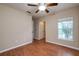 Large bedroom with wood flooring and ceiling fan at 4316 S Kirkman Rd # 1602, Orlando, FL 32811