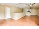 Living room with hardwood floors and kitchen view at 4316 S Kirkman Rd # 1602, Orlando, FL 32811