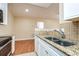 Kitchen features granite countertops and double sinks at 4316 S Kirkman Rd # 1602, Orlando, FL 32811