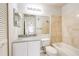Bathroom with granite vanity and a tub at 4316 S Kirkman Rd # 1602, Orlando, FL 32811