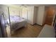 Spacious bedroom with a large bed and plenty of closet space at 4260 Climbing Aster Ct, Saint Cloud, FL 34772