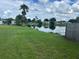 Serene backyard view overlooking a peaceful pond at 4260 Climbing Aster Ct, Saint Cloud, FL 34772