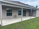 House exterior with covered patio at 4260 Climbing Aster Ct, Saint Cloud, FL 34772
