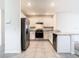White cabinets and stainless steel appliances at 2222 Elmsford Pt, Sanford, FL 32771