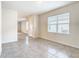 Simple dining area with tile floors and window at 2222 Elmsford Pt, Sanford, FL 32771