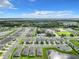 Aerial view of a community with houses and green spaces at 2222 Elmsford Pt, Sanford, FL 32771