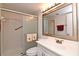 Bathroom with shower/tub combo, vanity, and mirror at 954 Courtyard Ln # 11, Orlando, FL 32825