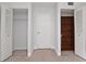 Bedroom with double closets and additional shelving at 954 Courtyard Ln # 11, Orlando, FL 32825