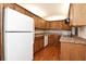 Efficient kitchen offering ample cabinetry and modern appliances at 954 Courtyard Ln # 11, Orlando, FL 32825