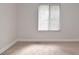 Spacious bedroom with neutral walls and carpeted floors at 954 Courtyard Ln # 11, Orlando, FL 32825