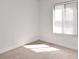Bright bedroom with neutral walls, carpet, and window blinds at 954 Courtyard Ln # 11, Orlando, FL 32825