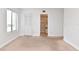 Bedroom with neutral carpeting and en-suite bathroom at 954 Courtyard Ln # 11, Orlando, FL 32825