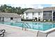 Inviting community pool and spa with ample deck space at 954 Courtyard Ln # 11, Orlando, FL 32825
