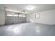 Clean and spacious garage with painted floor and automatic garage door at 1124 Munster St, Orlando, FL 32803